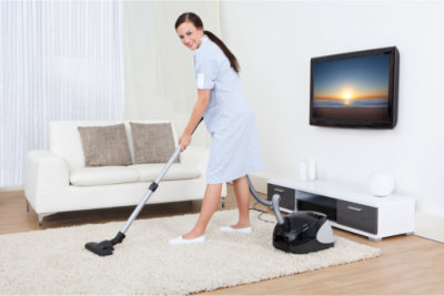 woman cleaning the house
